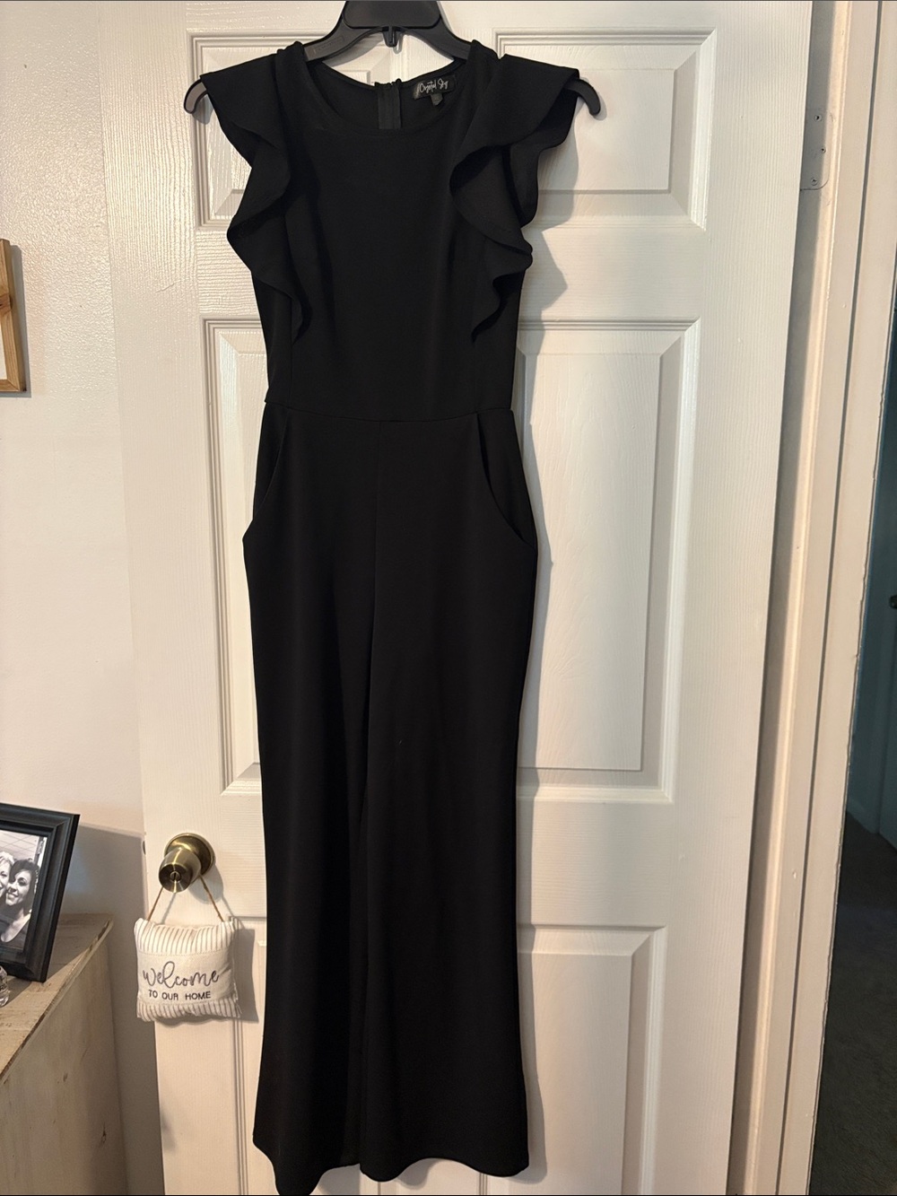 Classic Black Ruffle-Shoulder Jumpsuit